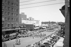 Parade on Broadway Avenue aerial view to the east, circa 1940’s- Photo courtesy of the Winston Reeves Collection, Southwest Collection/Special Collections Library